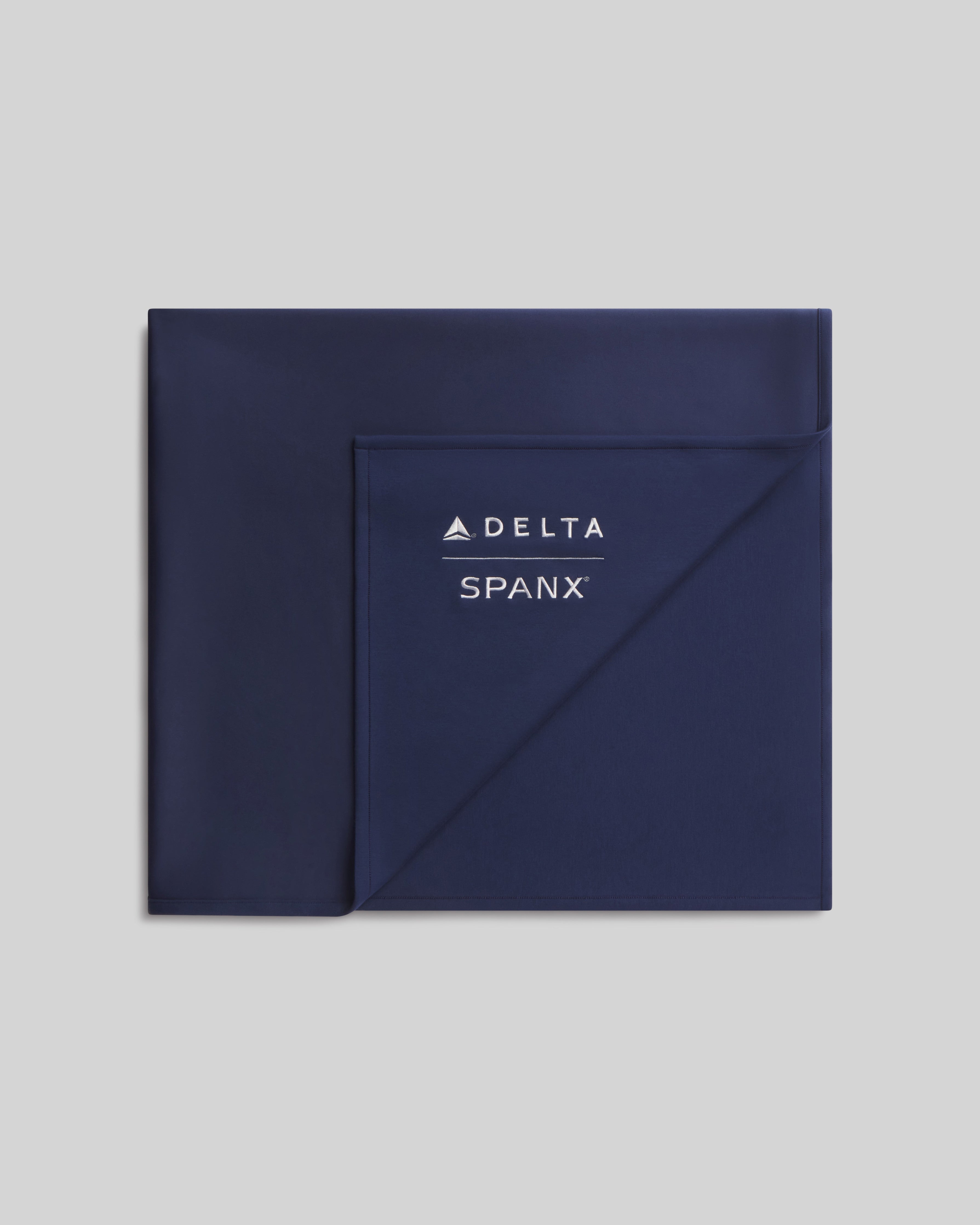 Delta x SPANX AirEssentials® Blanket | Timeless Navy